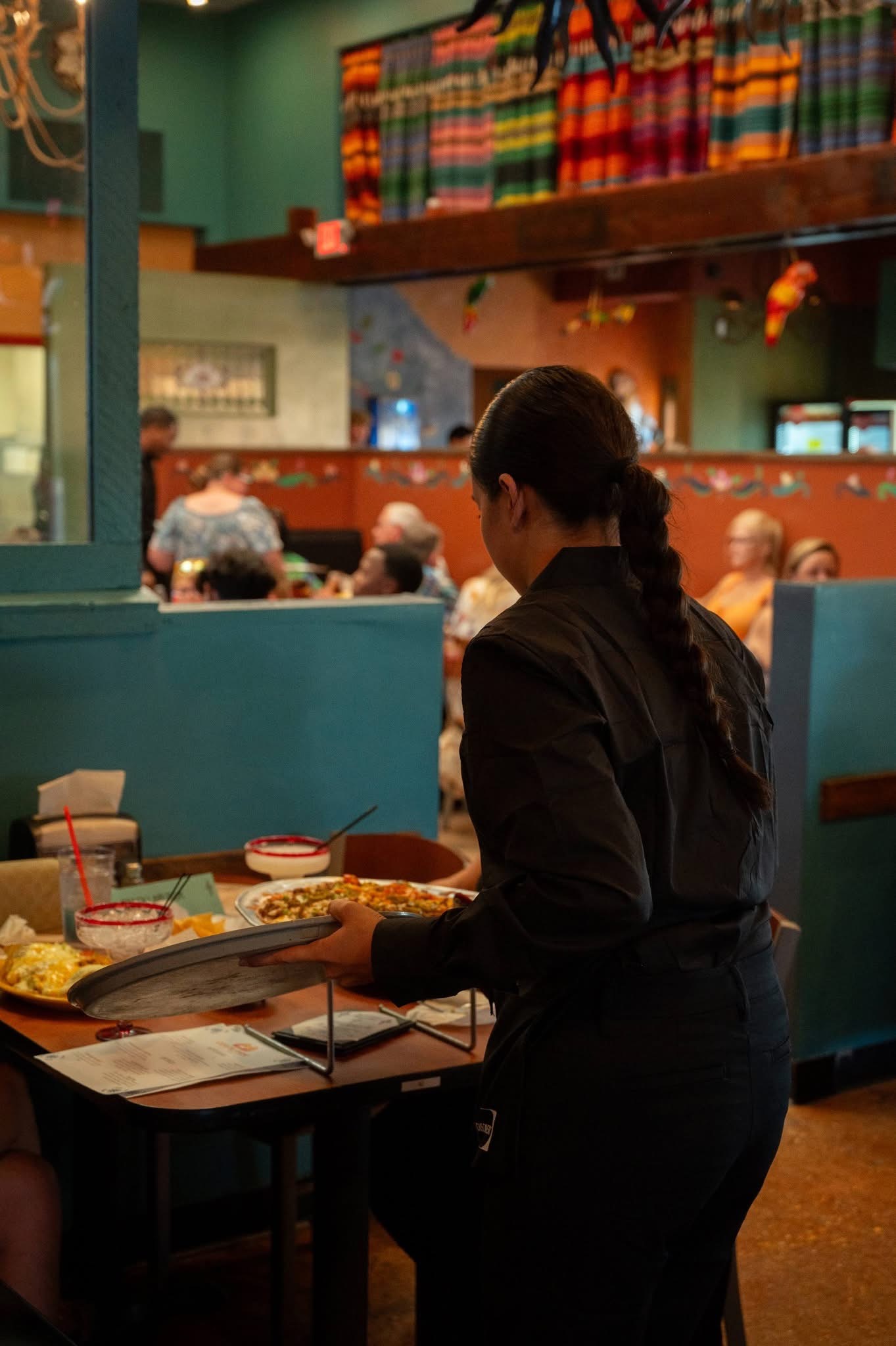 Server delivering food