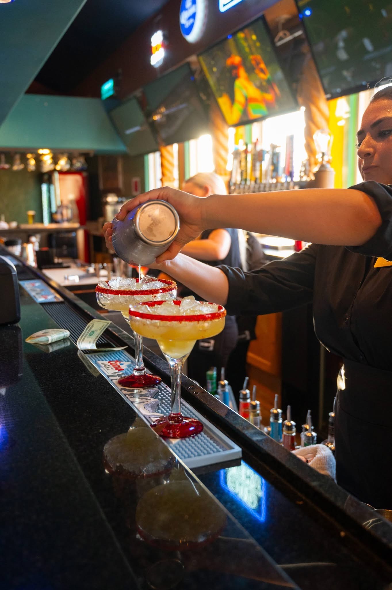 Bartender preparing margaritas